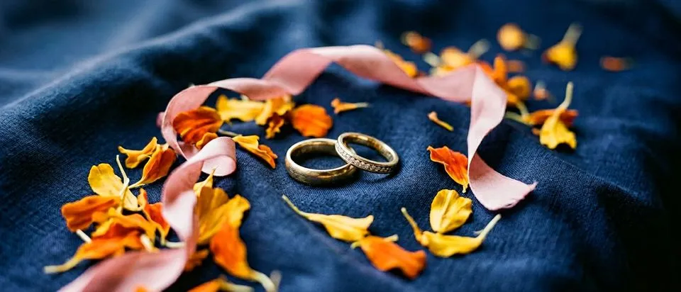 Wedding rings and ceremony details, editorial photograph